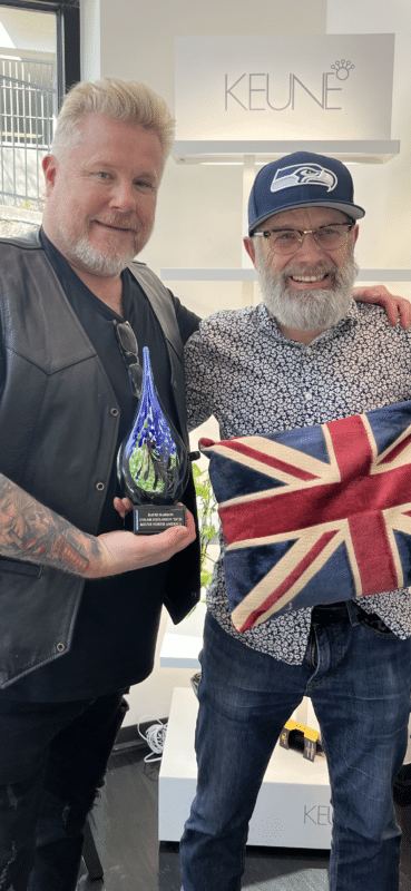David Barron holding his trophy for the Color Explosion category of the Keune North America Hairstylist Awards