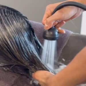 Washing the hair color out after processing